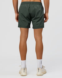 Man wearing Rep 5" Performance Short - Carbon Green | Model:Albert | Size:M | Thumbnail Index: 2