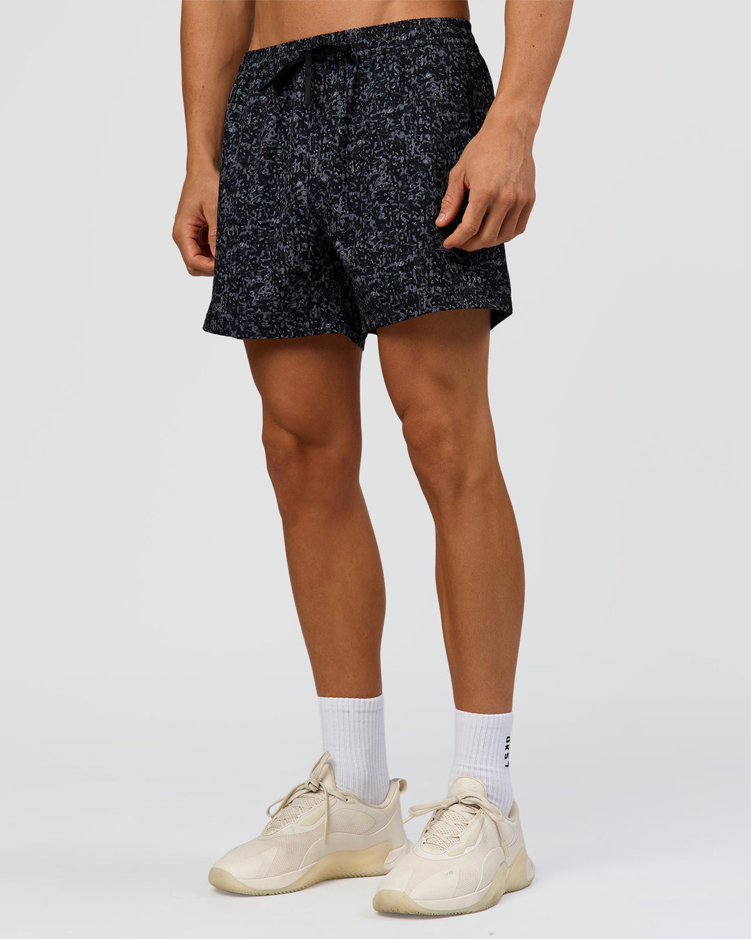 Man wearing Rep 5" Performance Short - Energy Print Black | Model:Albert | Size:M - view 3