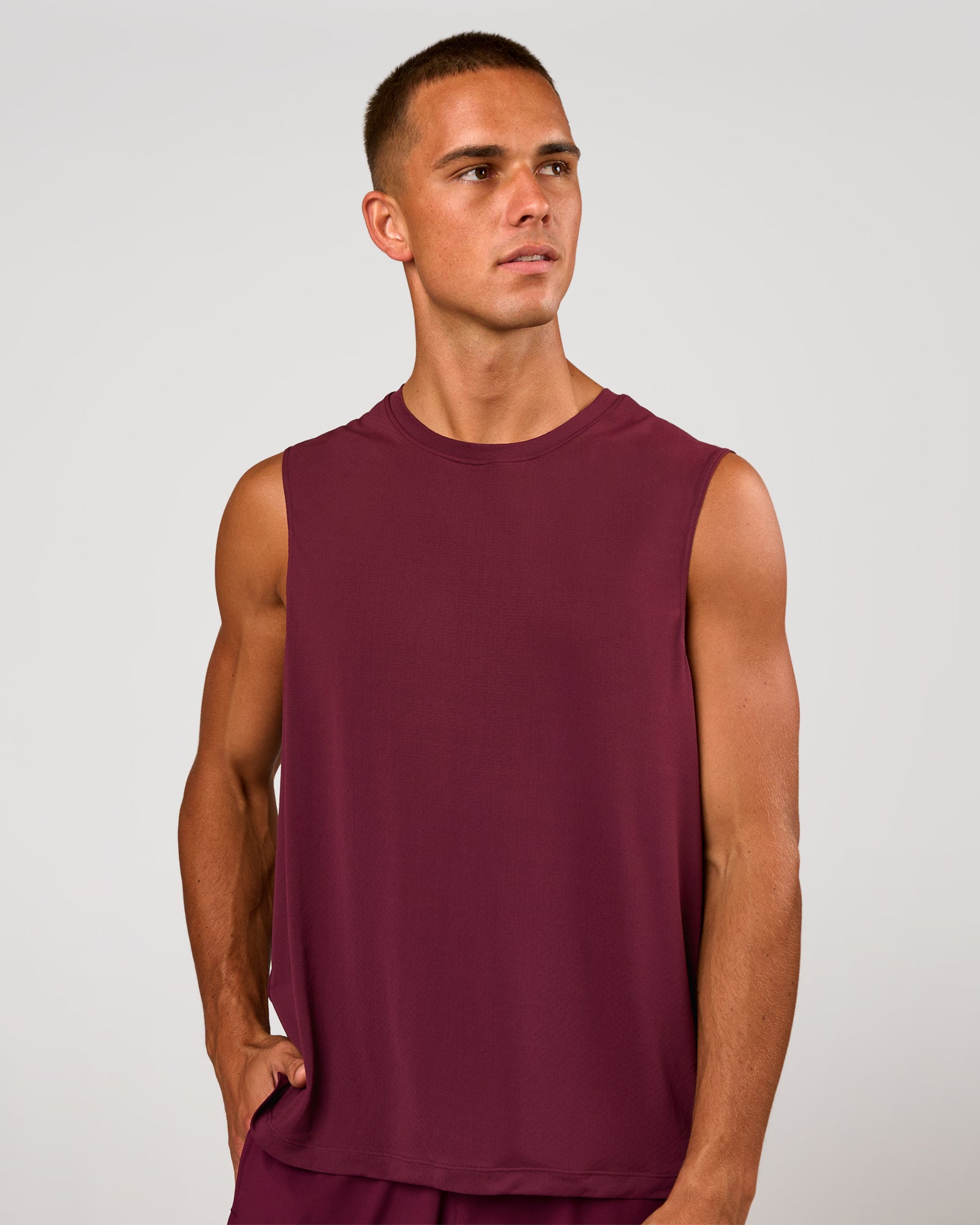 Man wearing Rep Muscle Training Tank - Cherry Lacquer | Model:Albert | Size:M