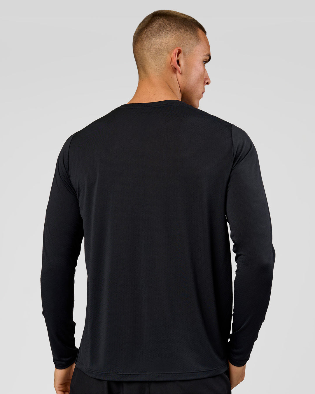 Man wearing Rep Training Long Sleeve  - Black | Model:Albert | Size:M - view 7