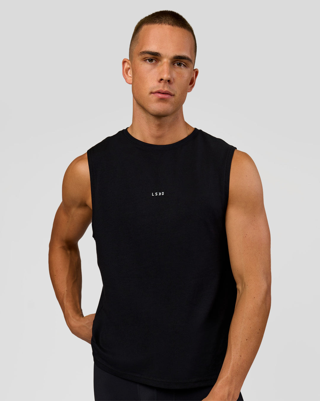 Man wearing Run Club FLXCotton Tank - Black-Electric Indigo | Model:Albert | Size:M - view 2