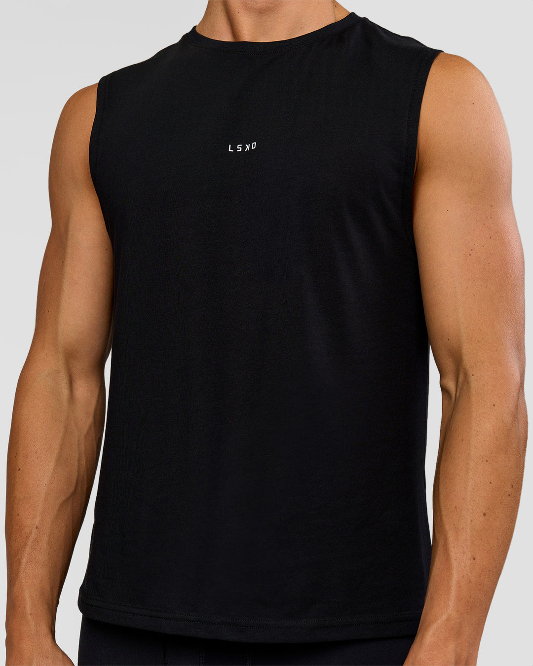 Man wearing Run Club FLXCotton Tank - Black-Electric Indigo | Model:Albert | Size:M - view 4