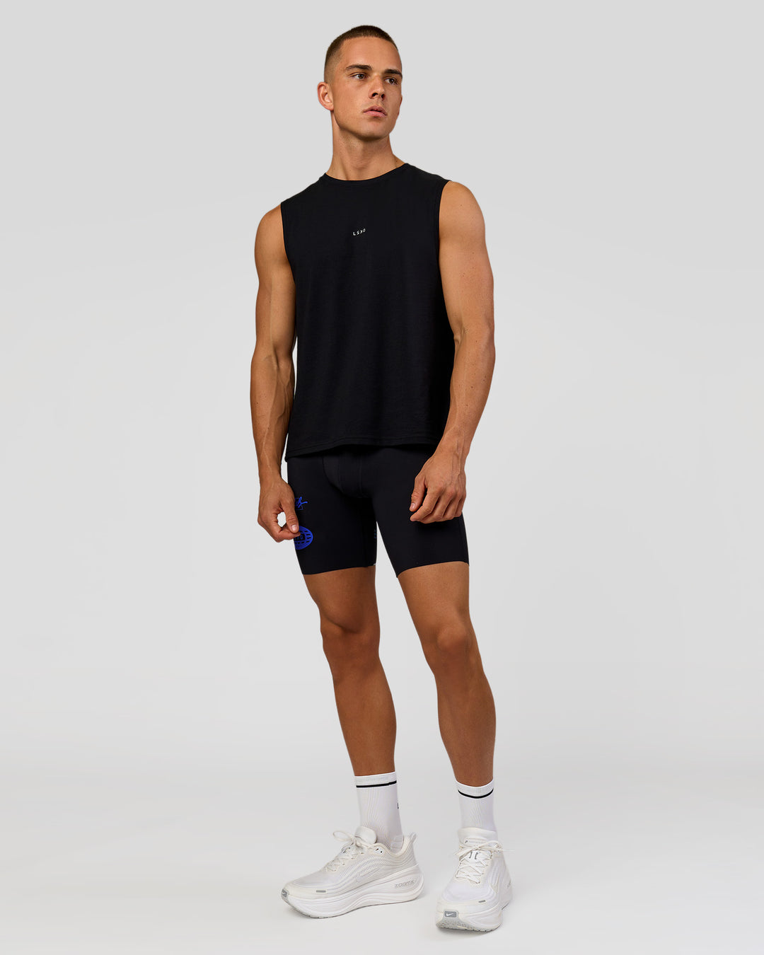 Man wearing Run Club FLXCotton Tank - Black-Electric Indigo | Model:Albert | Size:M - view 5