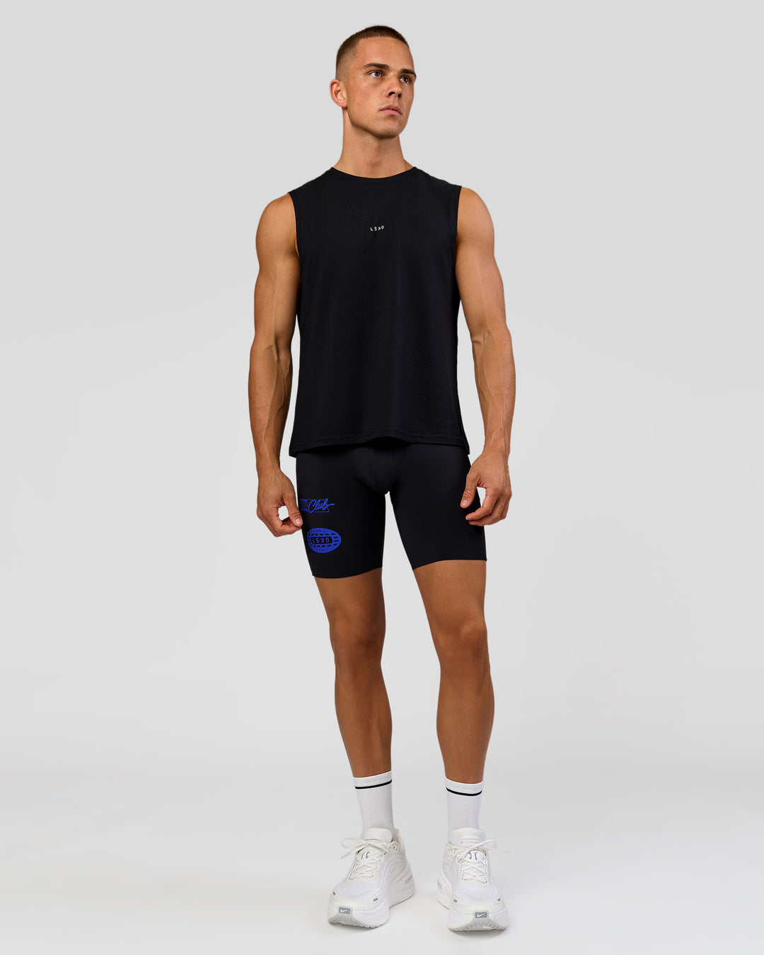 Man wearing Run Club FLXCotton Tank - Black-Electric Indigo | Model:Albert | Size:M - view 6