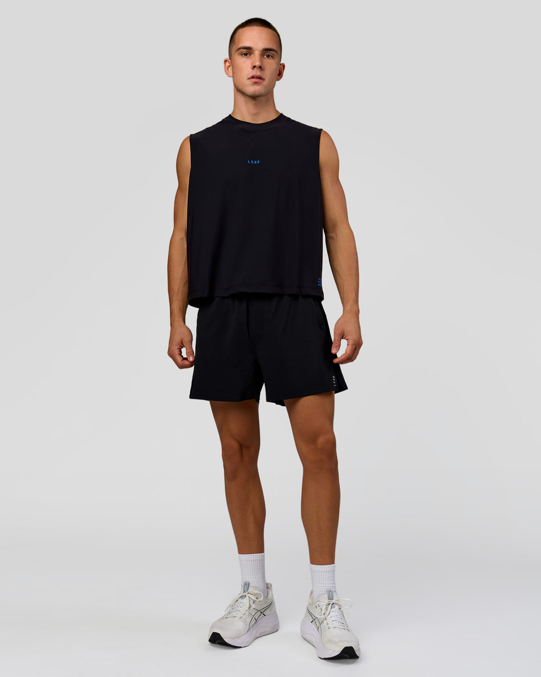 Man wearing Run Club Elevate Muscle Tank - Black-Electric Indigo | Model:Albert | Size:M - view 8