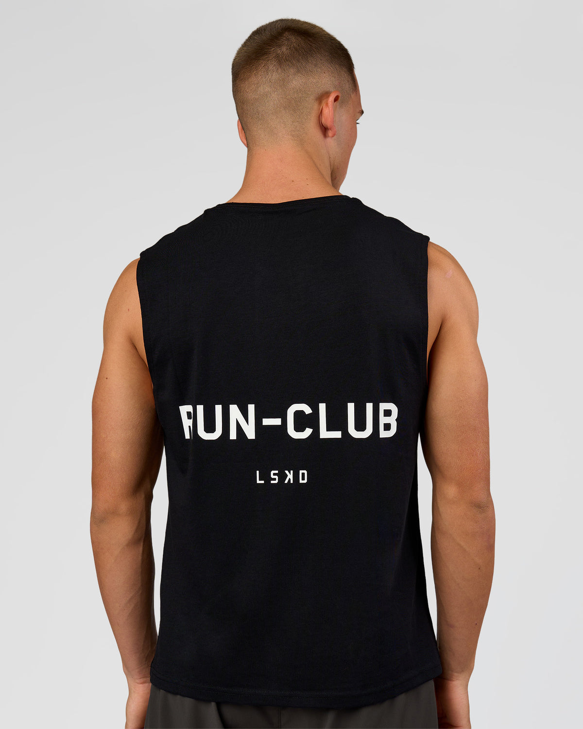 Man wearing Run Club FLXCotton Tank - Black-White | Model:Albert | Size:M