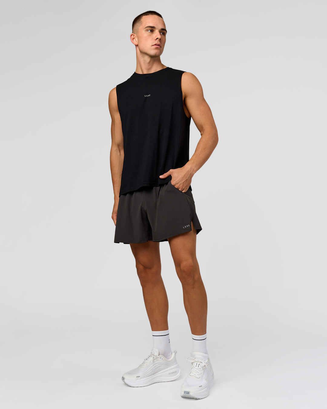 Man wearing Run Club FLXCotton Tank - Black-White | Model:Albert | Size:M - view 3