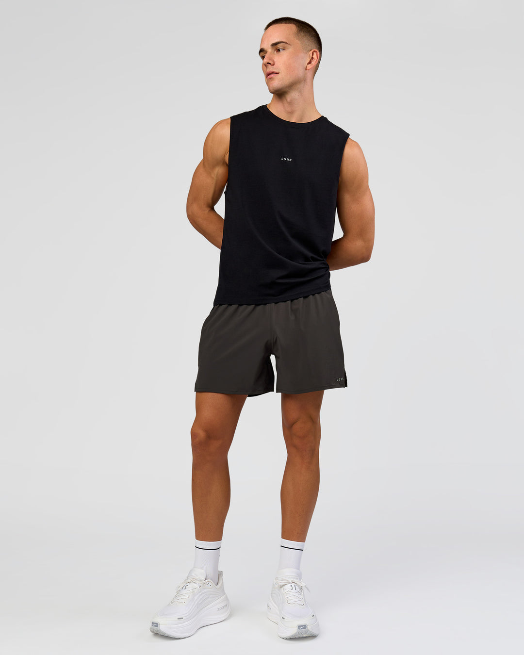 Man wearing Run Club FLXCotton Tank - Black-White | Model:Albert | Size:M - view 4