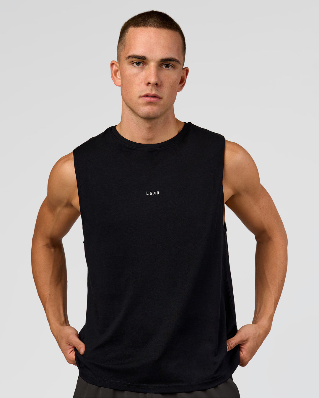 Man wearing Run Club FLXCotton Tank - Black-White | Model:Albert | Size:M - view 5