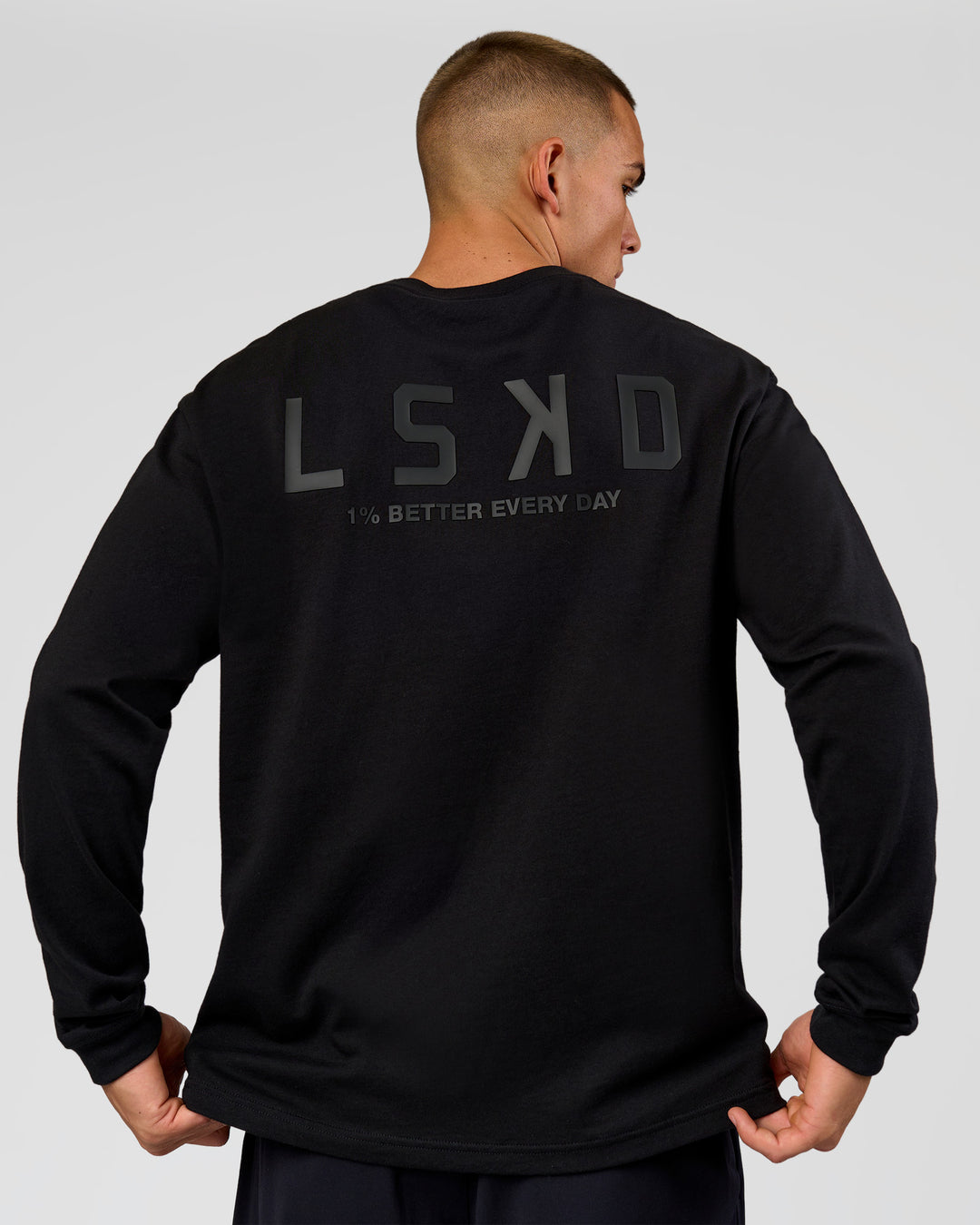 Man wearing Tonal Legacy Heavyweight Oversized LS Tee - Black-Black | Model:Albert | Size:M - view 1