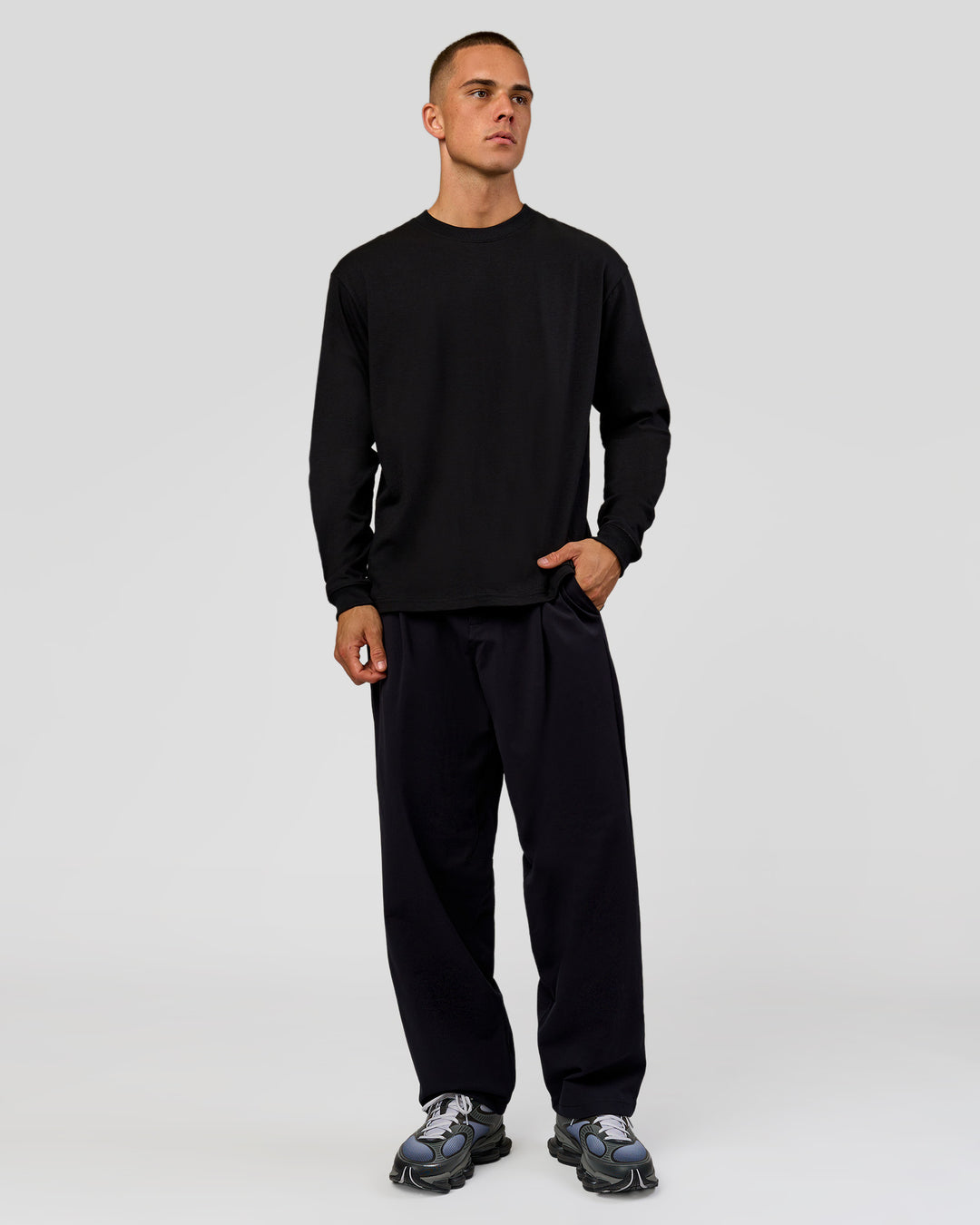 Man wearing Tonal Legacy Heavyweight Oversized LS Tee - Black-Black | Model:Albert | Size:M - view 4
