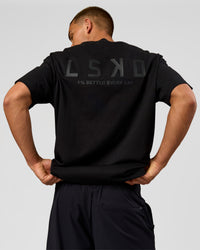 Man wearing Tonal Legacy Heavyweight Oversized Tee - Black-Black | Model:Albert | Size:M | Thumbnail Index: 10