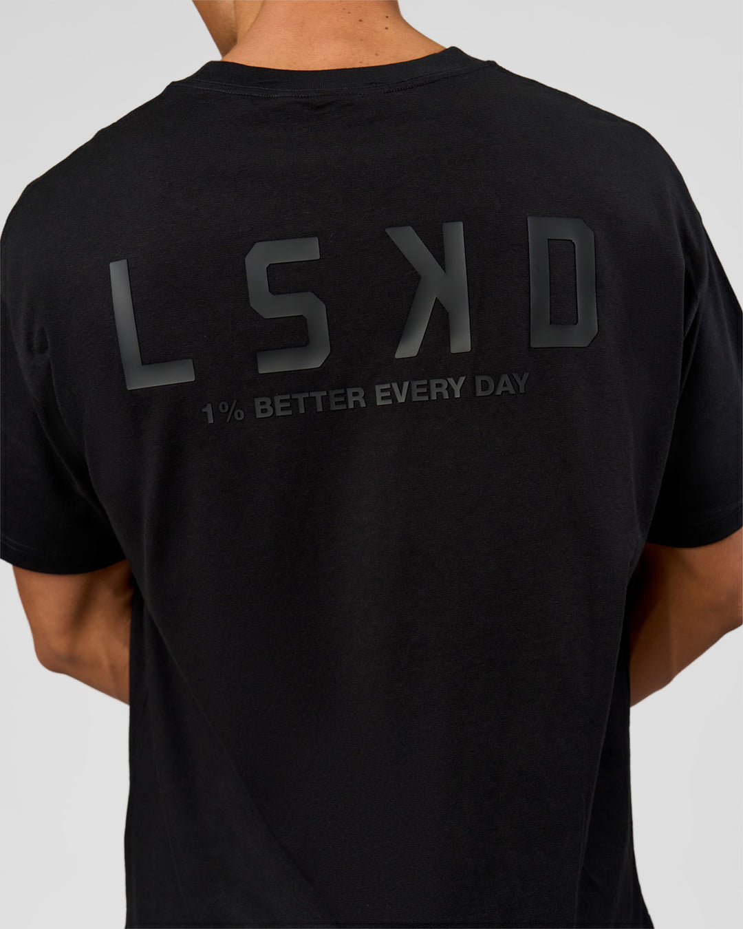Man wearing Tonal Legacy Heavyweight Oversized Tee - Black-Black | Model:Albert | Size:M - view 12