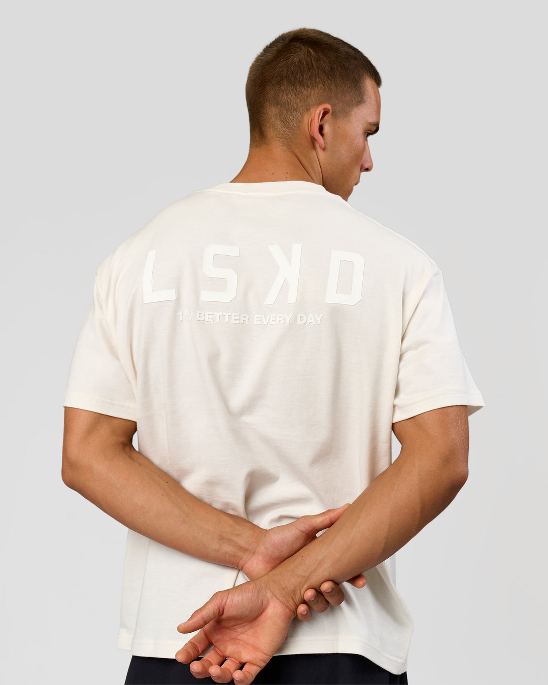 Man wearing Tonal Legacy Heavyweight Oversized Tee - Off White-Off White | Model:Albert | Size:M - view 2