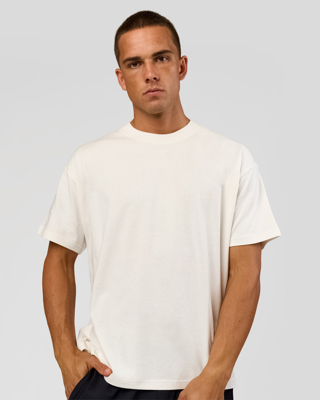 Man wearing Tonal Legacy Heavyweight Oversized Tee - Off White-Off White | Model:Albert | Size:M - view 5