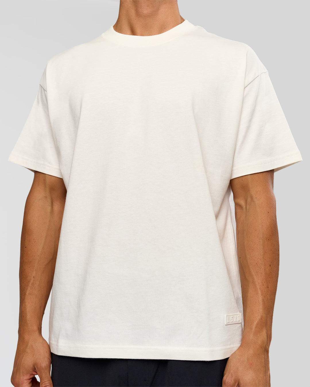 Man wearing Tonal Legacy Heavyweight Oversized Tee - Off White-Off White | Model:Albert | Size:M - view 8