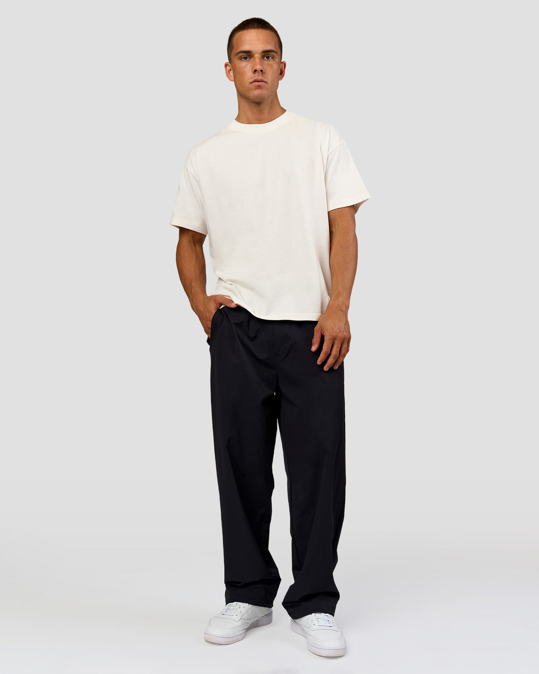 Man wearing Tonal Legacy Heavyweight Oversized Tee - Off White-Off White | Model:Albert | Size:M - view 10