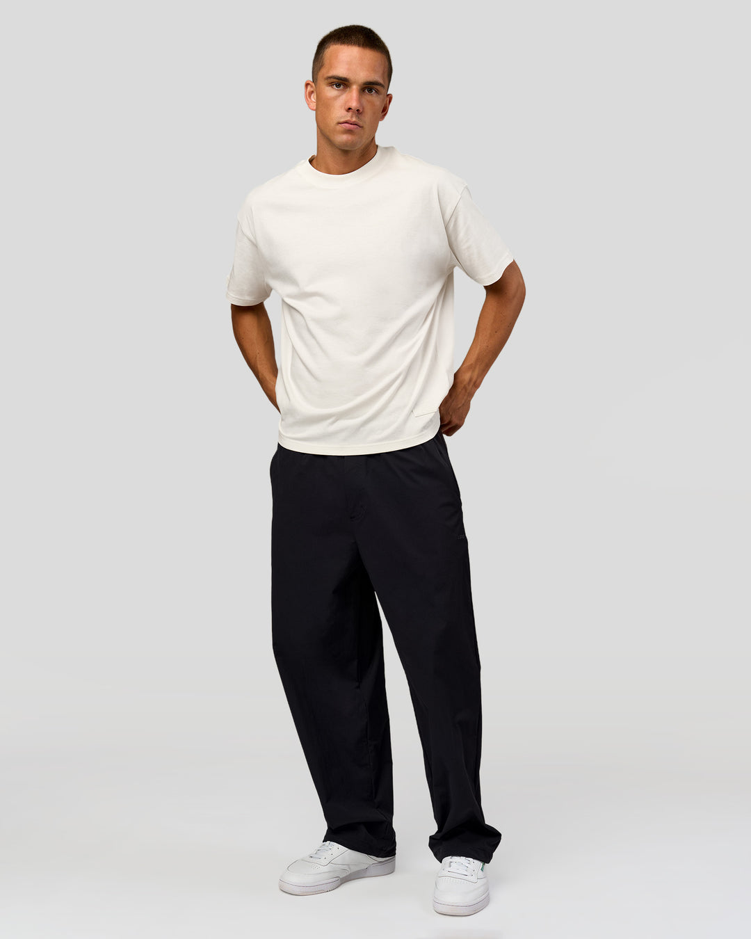 Man wearing Tonal Legacy Heavyweight Oversized Tee - Off White-Off White | Model:Albert | Size:M - view 12