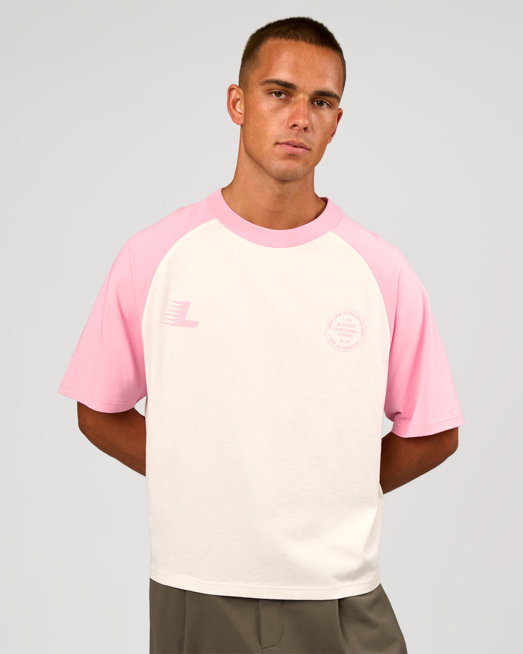 Man wearing Victory Heavyweight Boxed Raglan Tee - Off White-Pink Rose | Model:Albert | Size:M - view 2