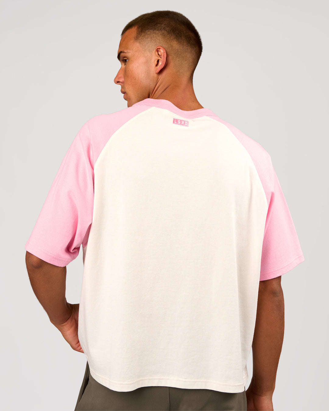 Man wearing Victory Heavyweight Boxed Raglan Tee - Off White-Pink Rose | Model:Albert | Size:M - view 7