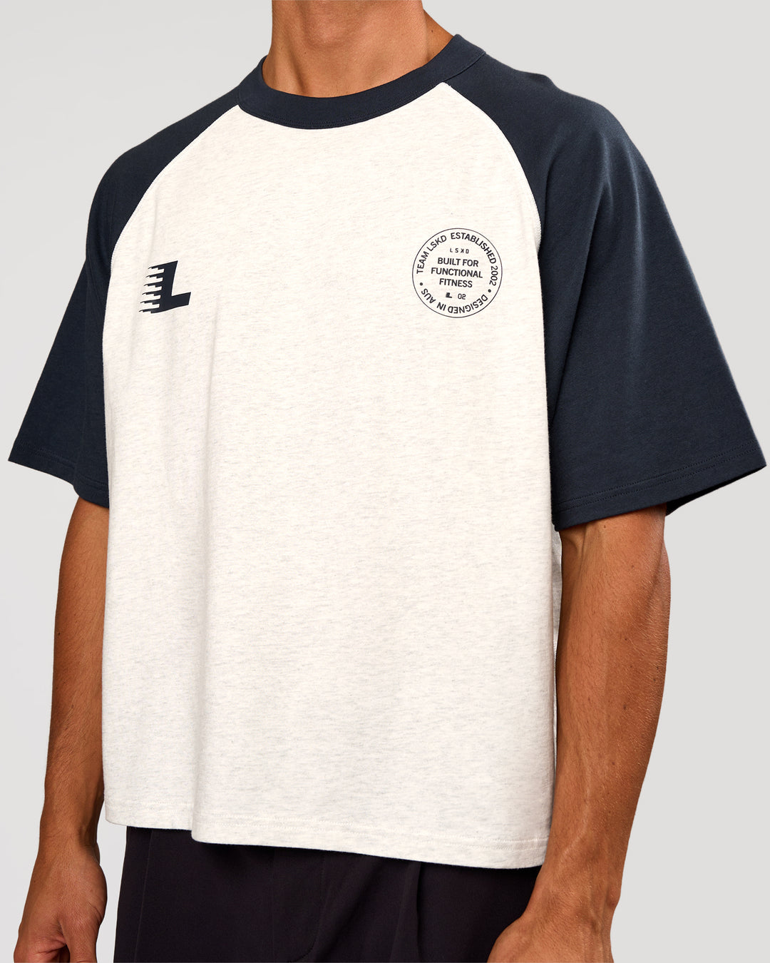 Man wearing Victory Heavyweight Boxed Raglan Tee - Silver Marl-Midnight Navy | Model:Albert | Size:M - view 6
