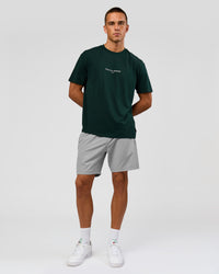 Man wearing VS1 Enjoy The Journey FLXCotton Oversize Tee - Midnight Green | Model:Albert | Size:M | Thumbnail Index: 10