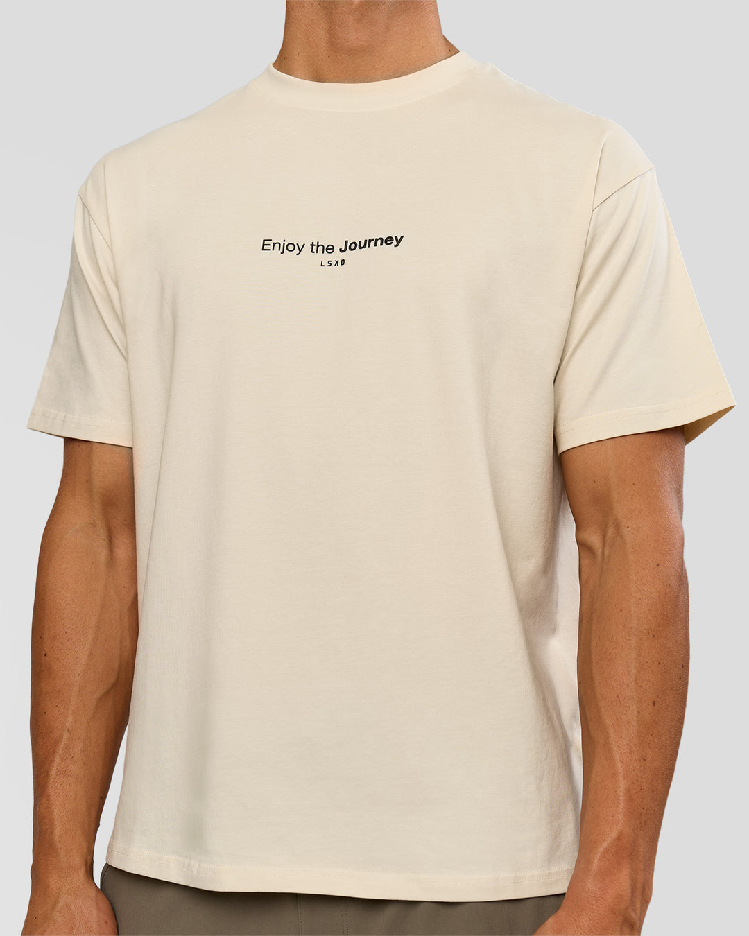 Man wearing VS1 Enjoy The Journey FLXCotton Oversize Tee - Vanilla Bean | Model:Albert | Size:M - view 4