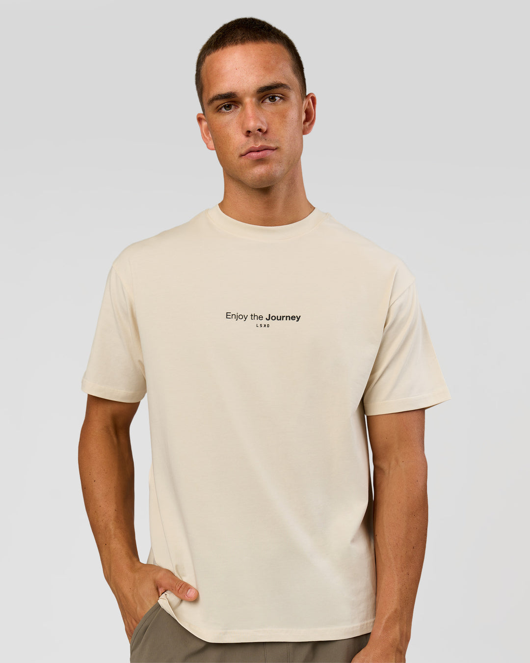 Man wearing VS1 Enjoy The Journey FLXCotton Oversize Tee - Vanilla Bean | Model:Albert | Size:M - view 11