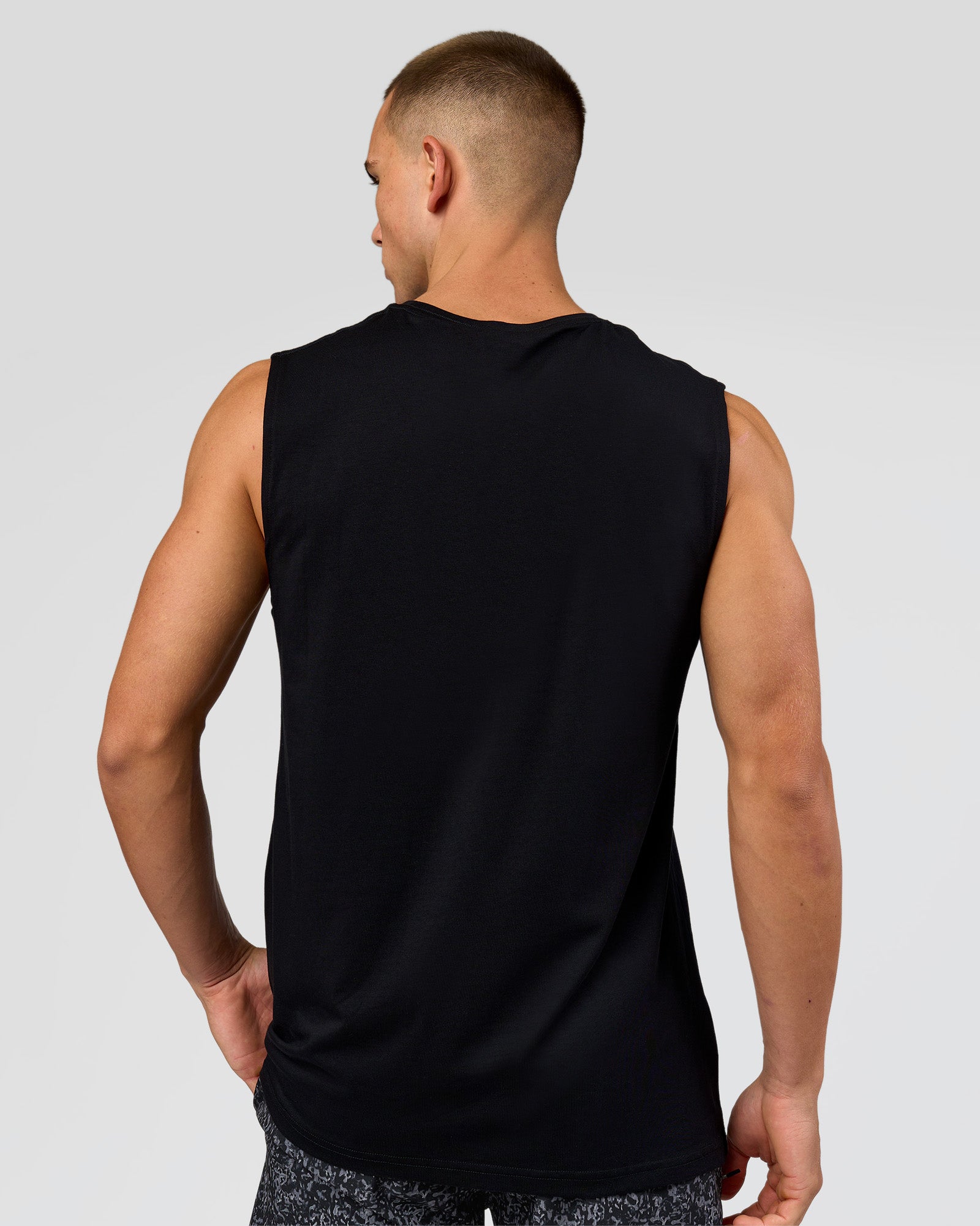 Man wearing Base FLXCotton Tank - Black | Model:Base | Size:M