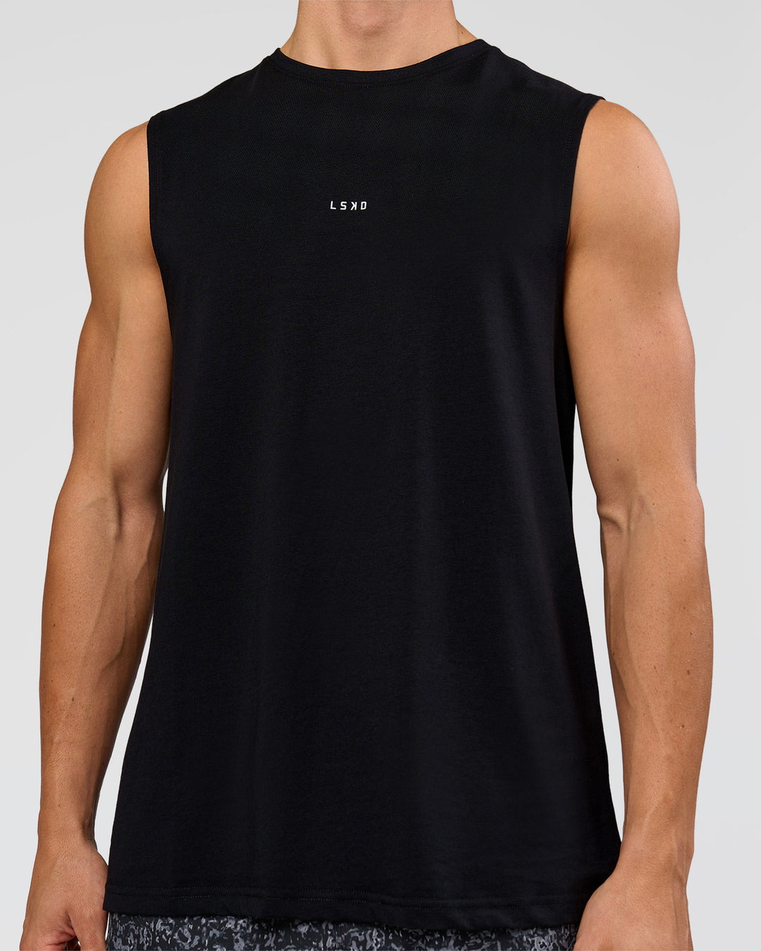 Man wearing Base FLXCotton Tank - Black | Model:Base | Size:M - view 1