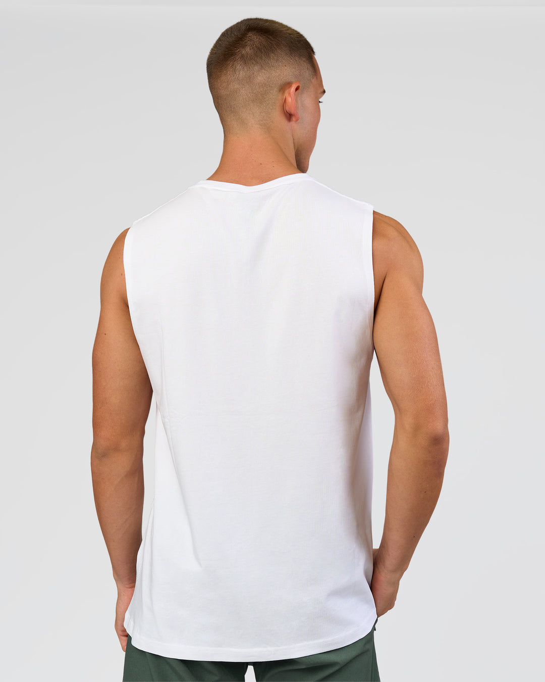 Man wearing Base FLXCotton Tank - White | Model:Base | Size:M - view 2