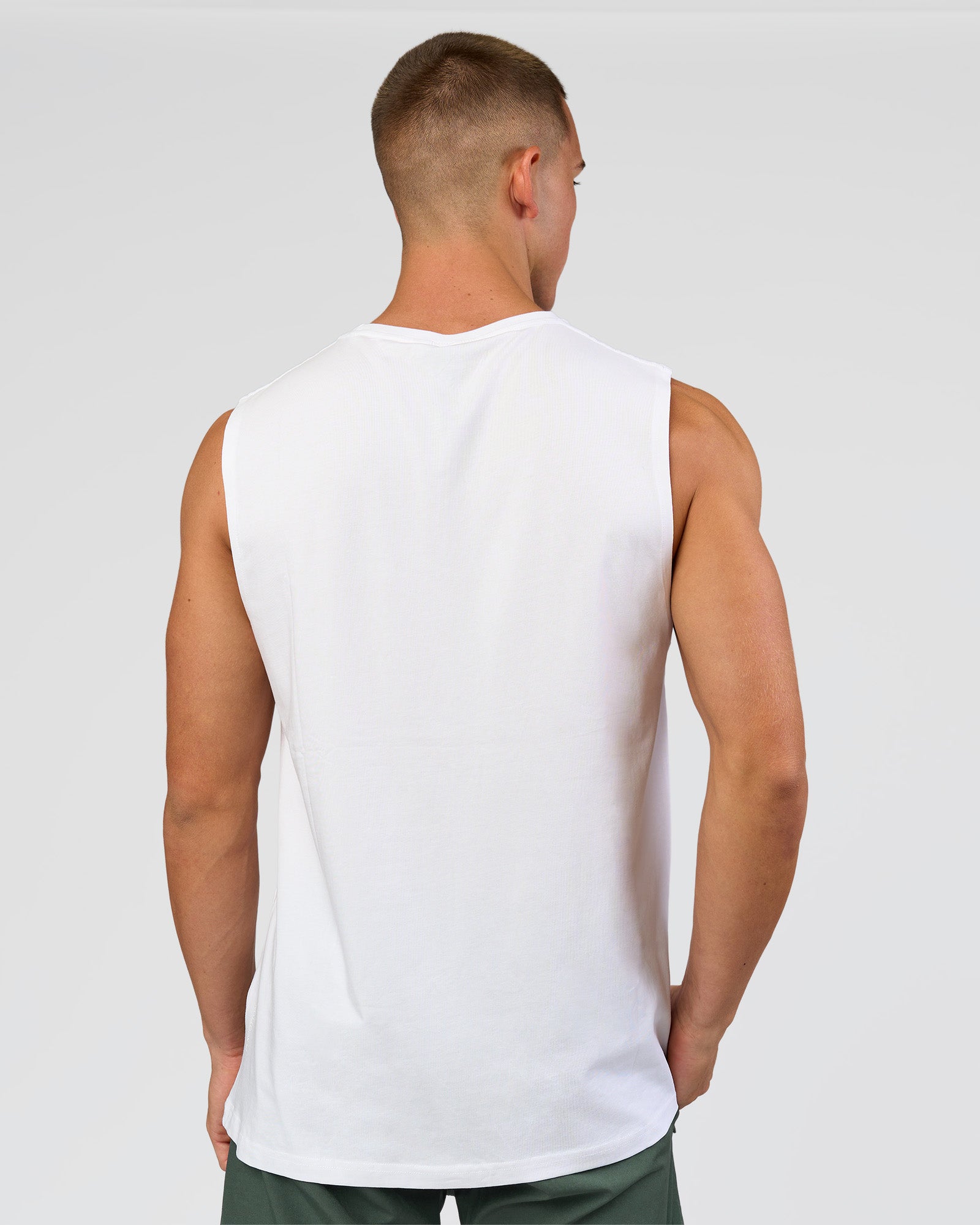 Man wearing Base FLXCotton Tank - White | Model:Base | Size:M