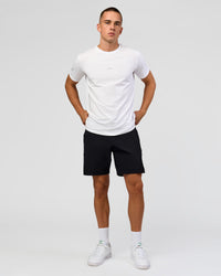 Man wearing Base FLXCotton Tee - White | Model:Base | Size:M | Thumbnail Index: 4
