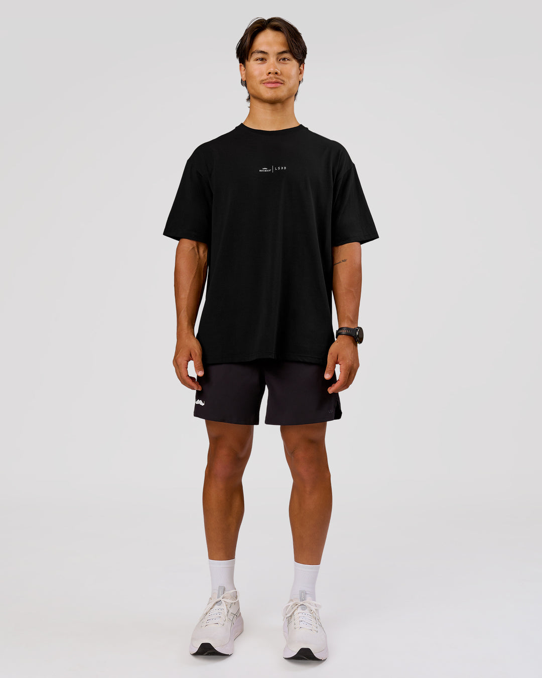 Man wearing Movember x LSKD FLXCotton Oversize Tee - Black-White | Model:George | Size:M - view 5