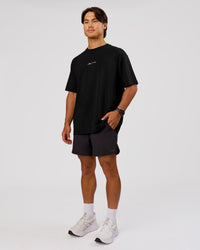 Man wearing Movember x LSKD FLXCotton Oversize Tee - Black-White | Model:George | Size:M | Thumbnail Index: 10