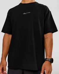Man wearing Movember x LSKD FLXCotton Oversize Tee - Black-White | Model:George | Size:M | Thumbnail Index: 11
