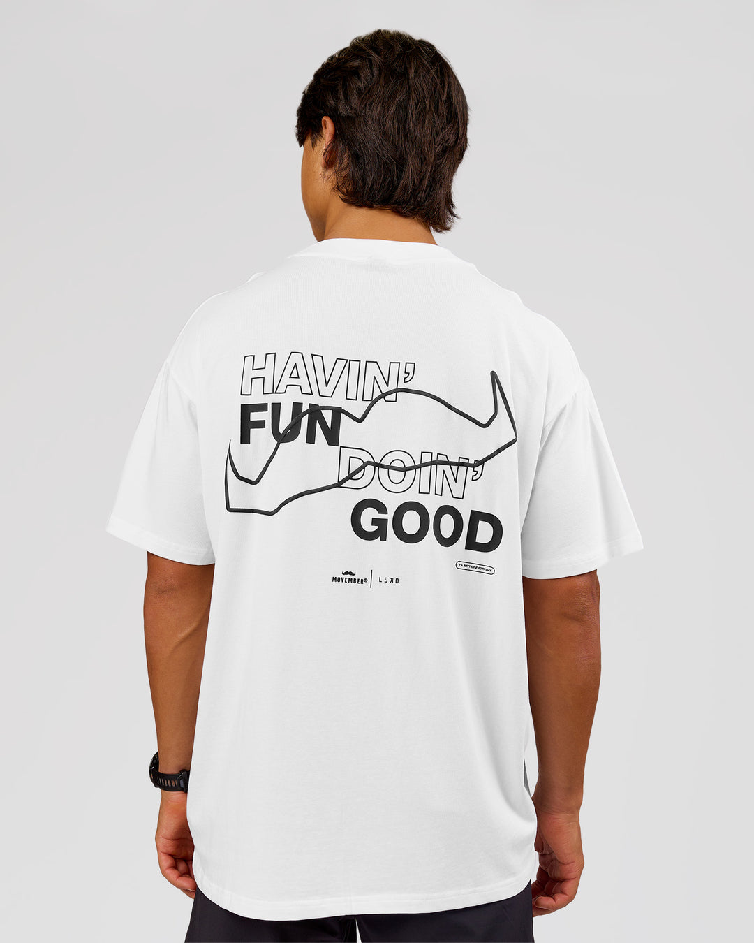 Man wearing Movember x LSKD FLXCotton Oversize Tee - White-Black | Model:George | Size:M - view 1