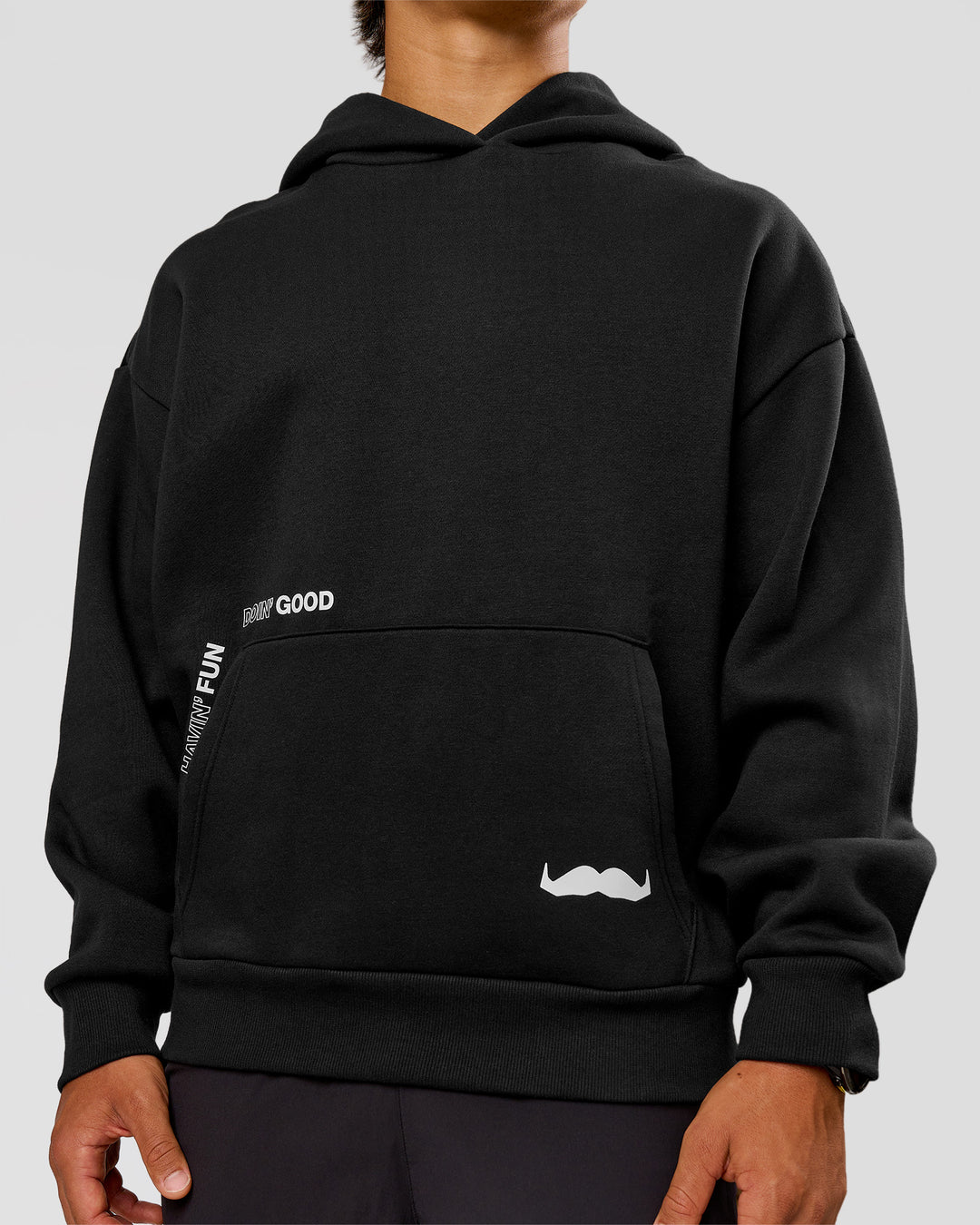 Man wearing Movember x LSKD Oversized Hoodie - Black | Model:George | Size:M - view 9