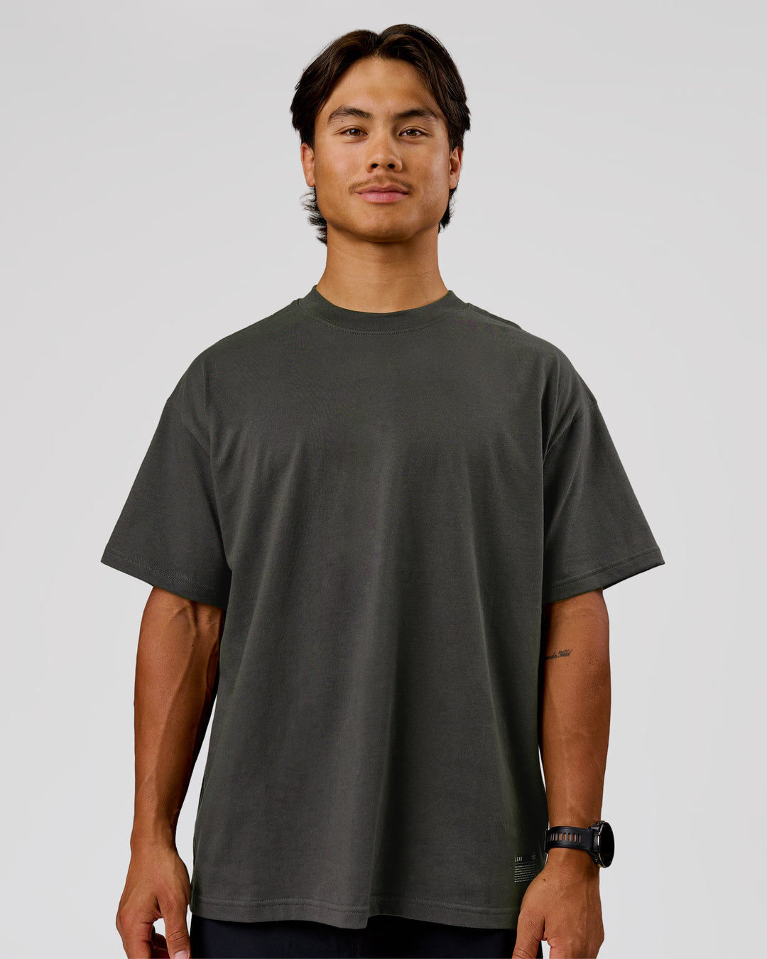 Man wearing Strata Heavyweight Oversized Tee - Onyx | Model:George | Size:M - view 5