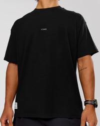 Man wearing VS26 1% Better FLXCotton Oversize Tee - Black-White | Model:George | Size:M | Thumbnail Index: 4