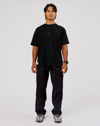 Man wearing VS26 1% Better FLXCotton Oversize Tee - Black-White | Model:George | Size:M | Thumbnail Index: 9