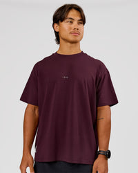Man wearing VS26 1% Better FLXCotton Oversize Tee - Cherry Lacquer-Off White | Model:George | Size:M | Thumbnail Index: 4