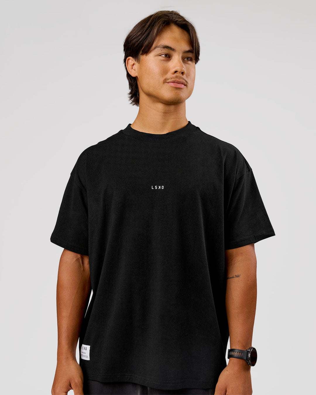 Man wearing VS26 Journey FLXCotton Oversize Tee - Black-White | Model:George | Size:M - view 9