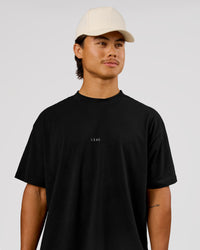 Man wearing VS26 MFBS FLXCotton Oversize Tee - Black-White | Model:George | Size:M | Thumbnail Index: 6