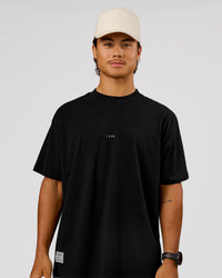 Man wearing VS26 MFBS FLXCotton Oversize Tee - Black-White | Model:George | Size:M | Thumbnail Index: 4