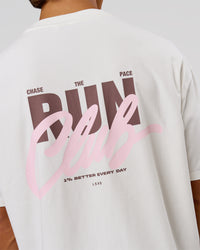 Man wearing Run Club Unisex Oversized Heavyweight FLXCotton Tee - Off White | Model:George | Size:M | Thumbnail Index: 6