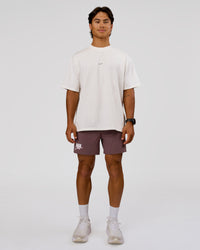 Man wearing Run Club Unisex Oversized Heavyweight FLXCotton Tee - Off White | Model:George | Size:M | Thumbnail Index: 4