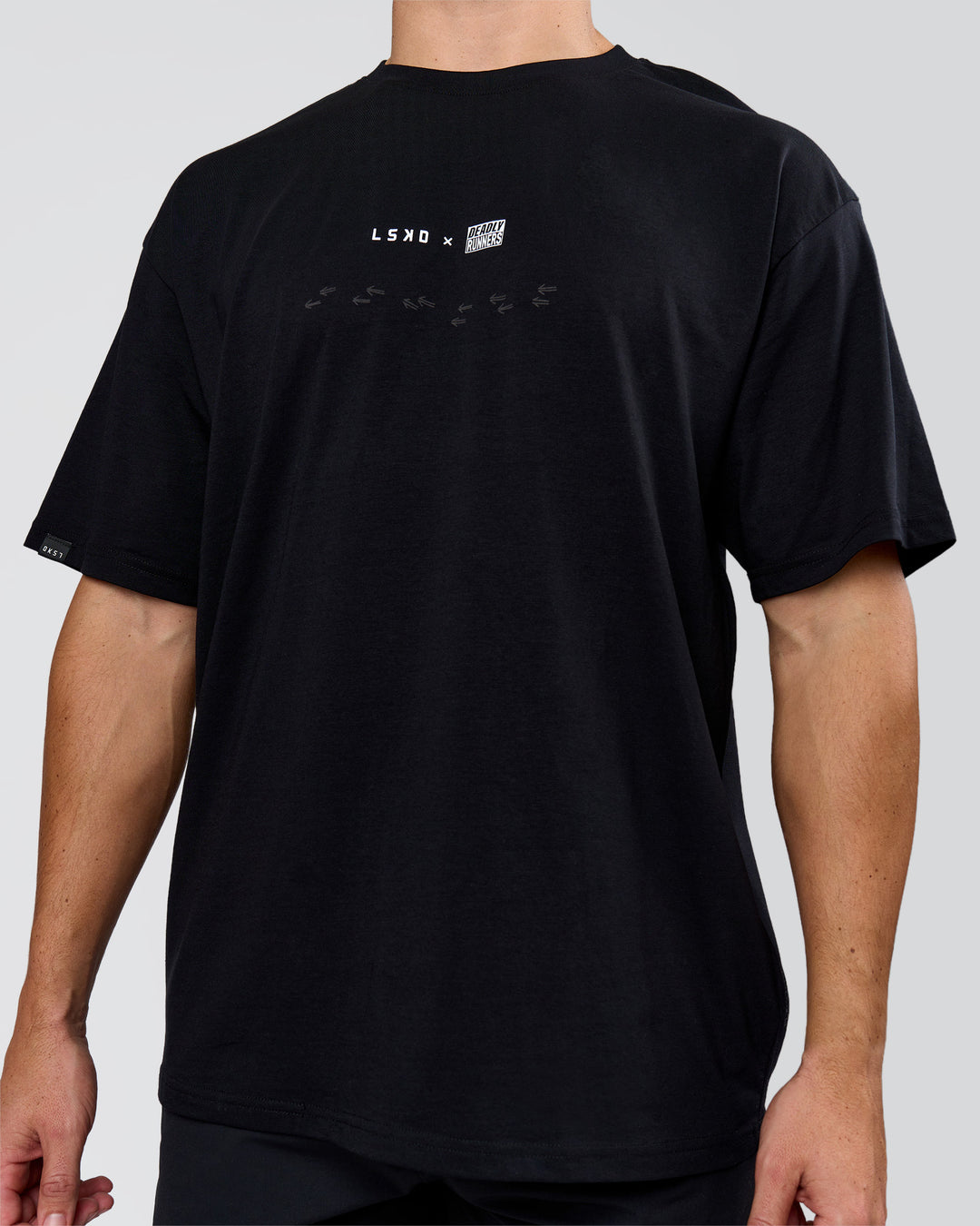 Man wearing Deadly Runners Run Club FLXCotton Oversize Tee - Black | Model:Jaiden | Size:M - view 15