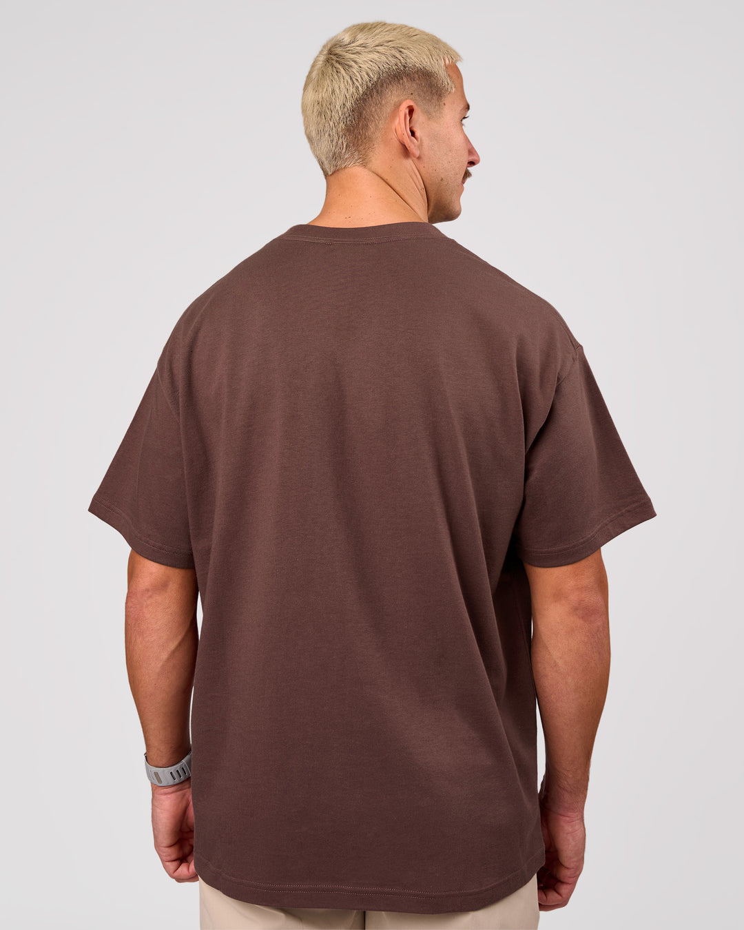 Man wearing Varsity EST Heavyweight Oversized Tee  - Cocoa Powder-Off White | Model:Jaiden | Size:M - view 3