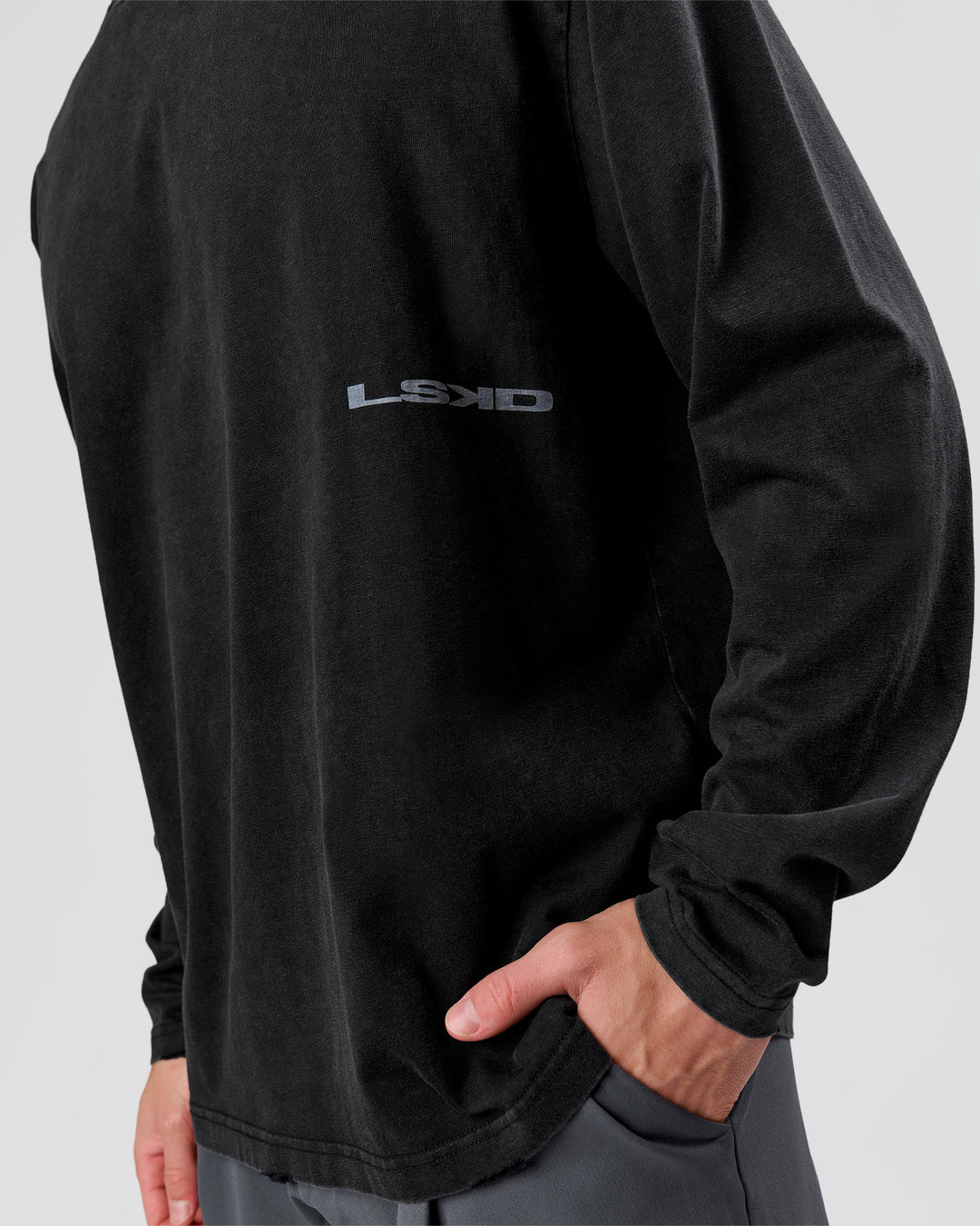 Man wearing Backline Washed Heavyweight Oversized LS Tee - Black Washed | Model:Leandro | Size:M - view 3